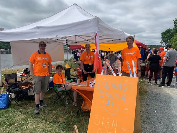Regatta 22 Booth & volunteers.jpg