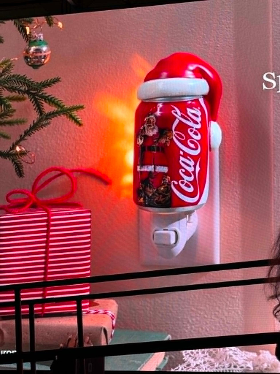 Scentsy 2026 Holiday Collection featuring A Christmas Story Leg Lamp Warmer, A Coca-Cola collaboration, and Buddy the Elf!