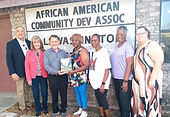 African American Center photo with journal presentation 5Jan2026 (1).jpeg