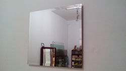 Espejo biselado y flotado