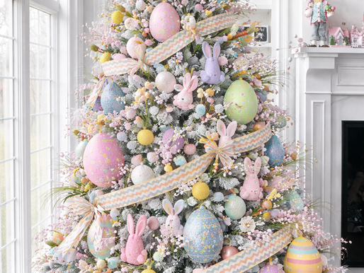 Pastel Easter tree decor with oversized egg ornaments, woven ribbon, floral picks, and bunny decorations