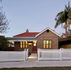 A house with white fences.