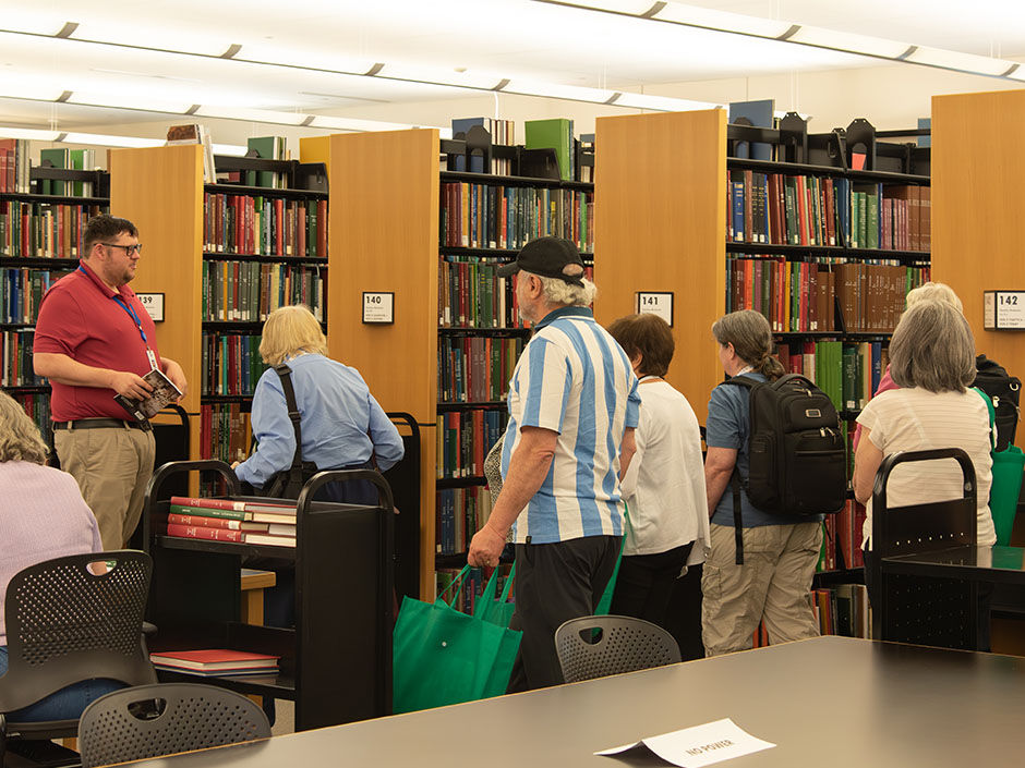 A group of people touring the Genealogy Center