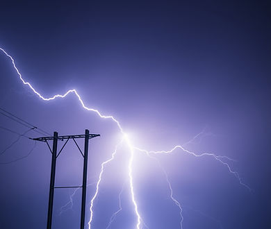 lightning hitting an electrical pole