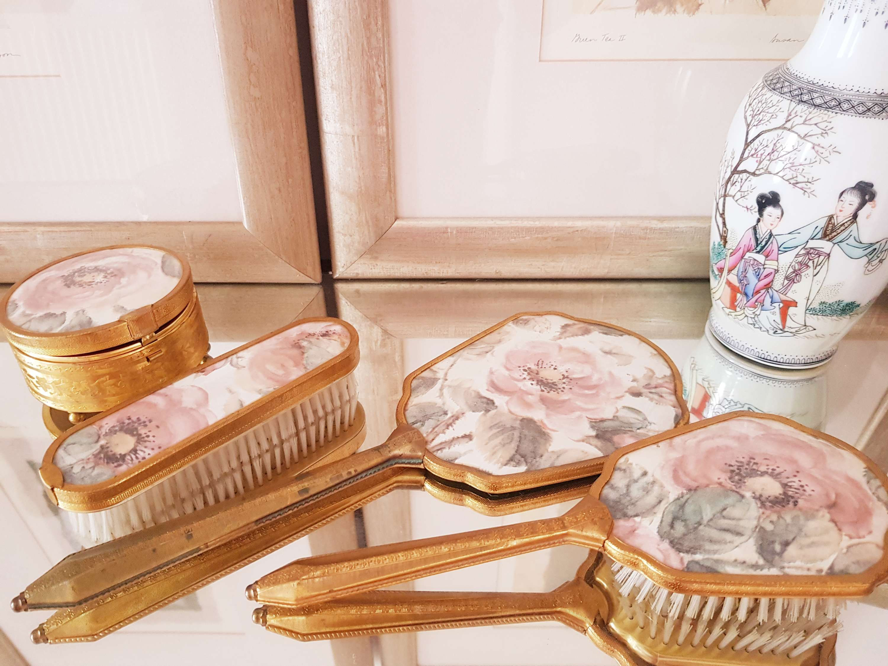 Floral decorated 4 piece enamel and brass vanity set