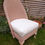 Thumbnail: Pastel pink & cream 1950's Lloyd Loom style wicker chair with sprung seat