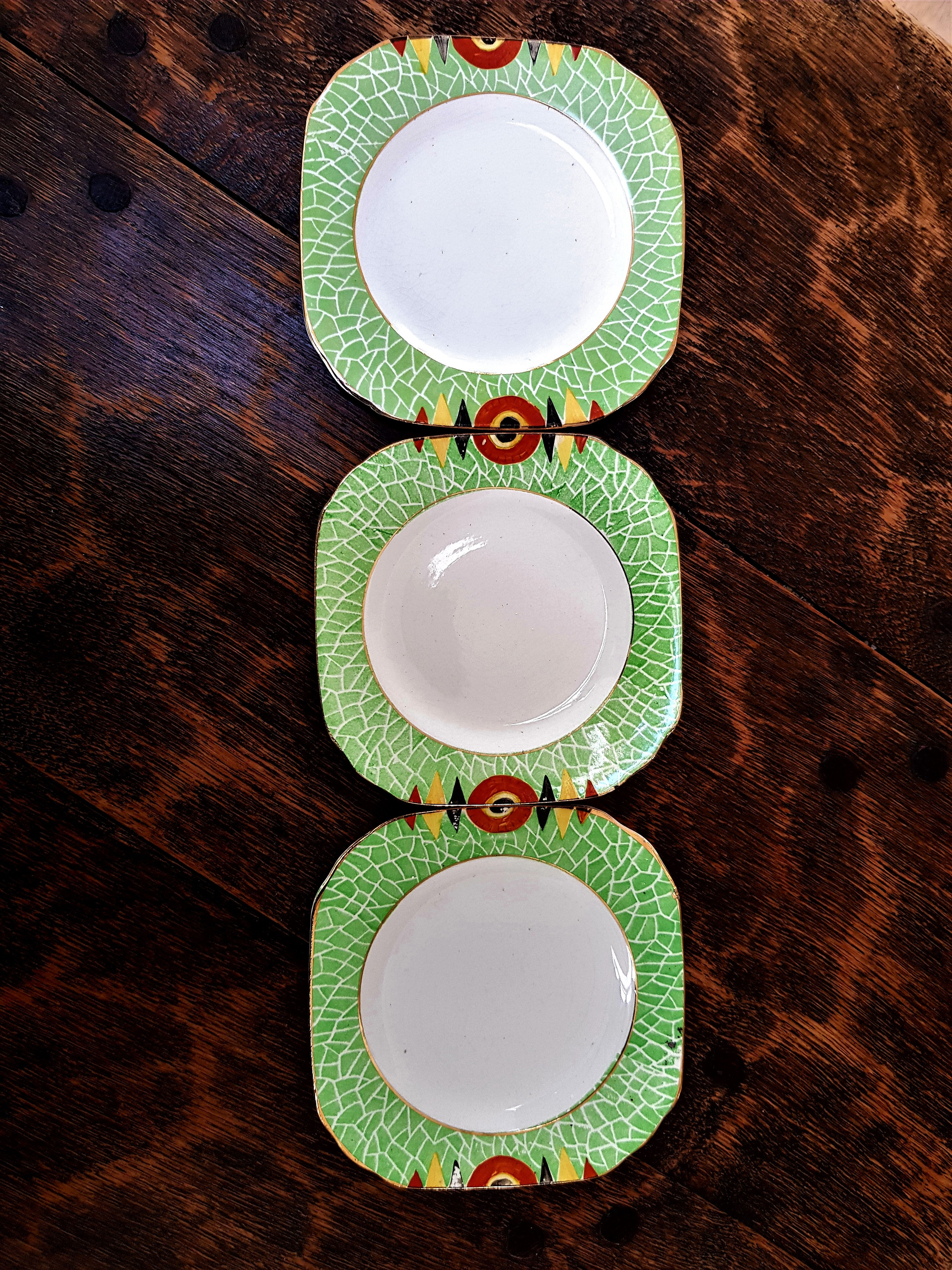 Trio of art deco, hand-painted, rectangular side plates
