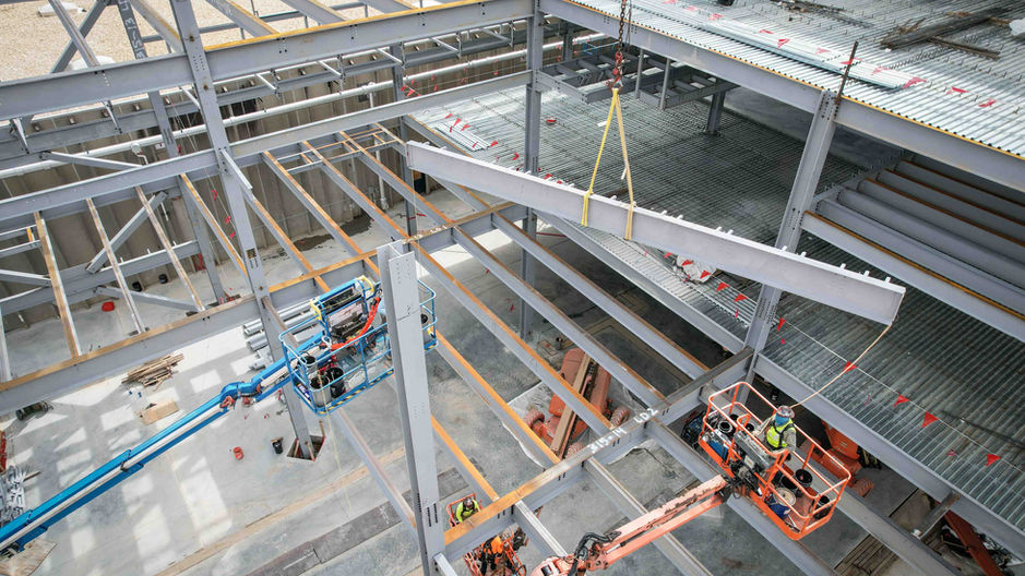 steel workers placing beams, jb steel erectors