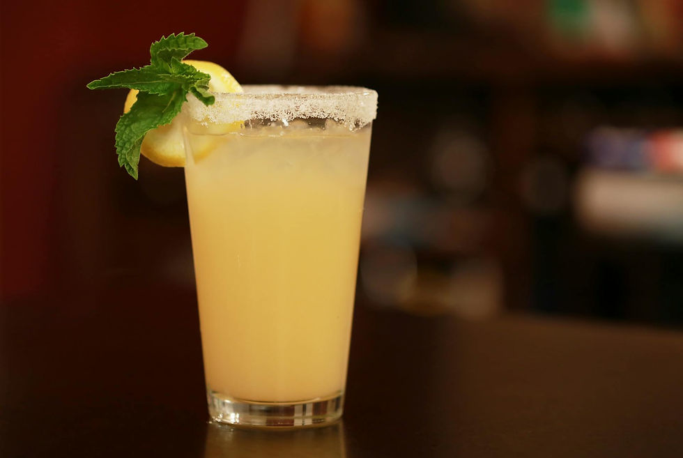 A mixed drink sits ready for a guest at a PNW wedding or event