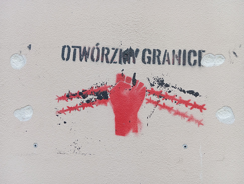 Twórczość ścienna zwolenników migracji bez granic.