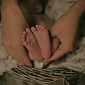 person holding baby's feet_edited_edited