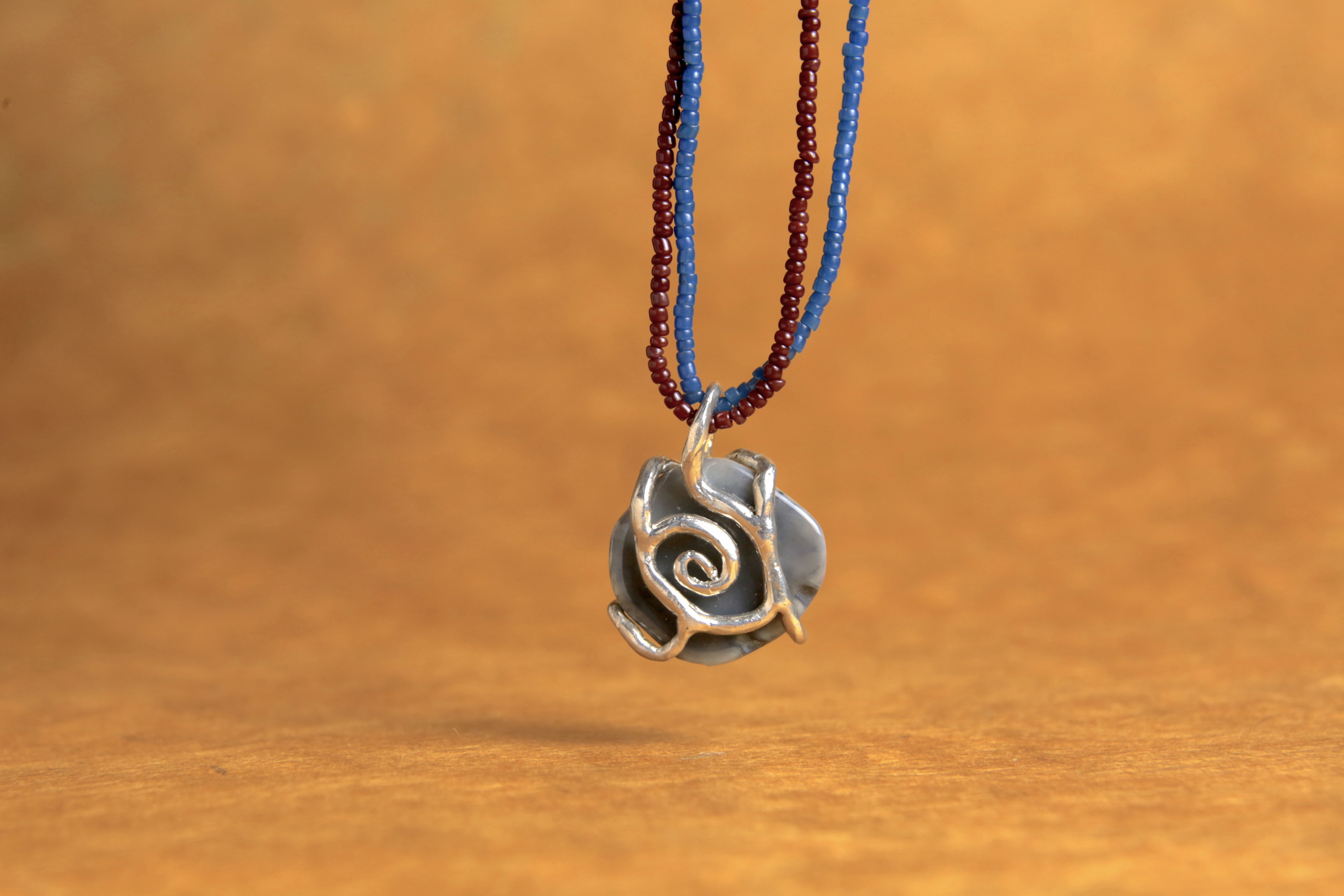 Fossilized clamshell wrapped in sterling silver. Millions of years old!