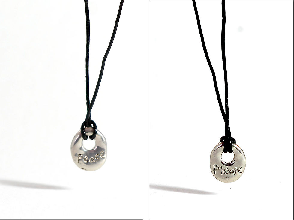 A simple message: "peace please" - hand crafted silver charm on leather