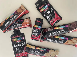 Assortimento di barrette e gel energetici Massigen Sport