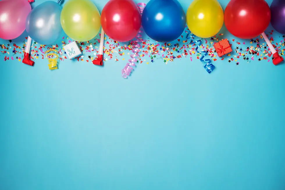 Palloncini colorati e coriandoli su sfondo azzurro.