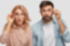 stunned-beautiful-woman-and-his-man-partner-looks-with-eyes-full-of-disbelief-stare-throug