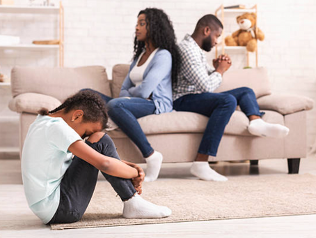 Parents fighting in fornt of child