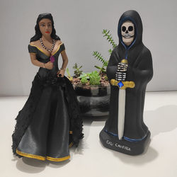 Exu Caveira e Maria Mulambo