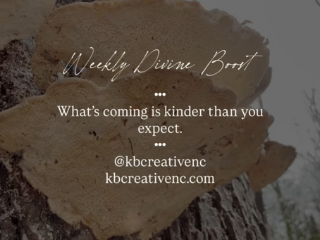 Nature photograph of pale shelf mushrooms growing on the side of a textured tree trunk, overlaid with the text “Weekly Divine Boost” and the quote “What’s coming is kinder than you expect,” along with the handle @kbcreativenc and website kbcreativenc.com.