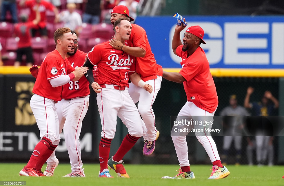 Reds Snap Brewers 14 Game Win Streak In Extras