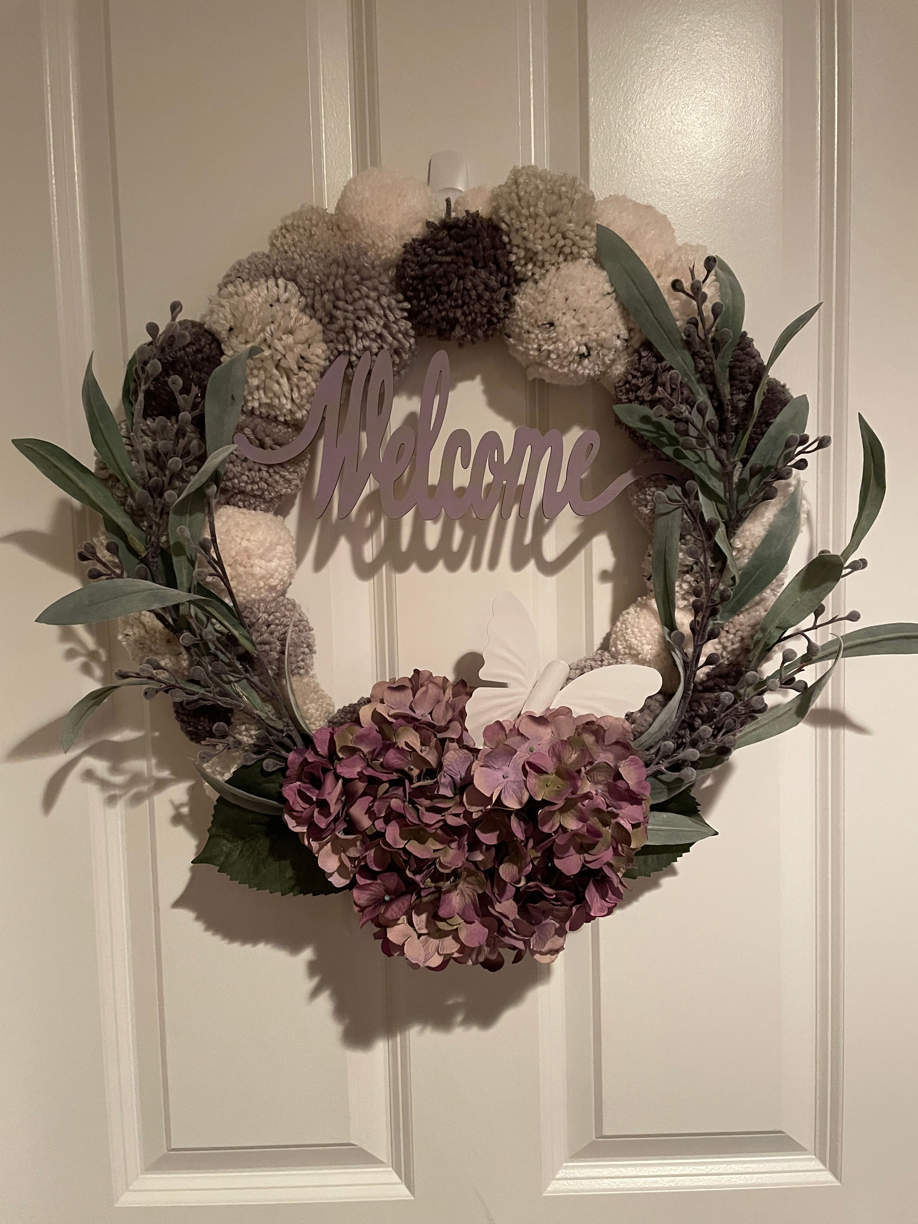 Front view of the "Lilac Welcome" handcrafted wreath