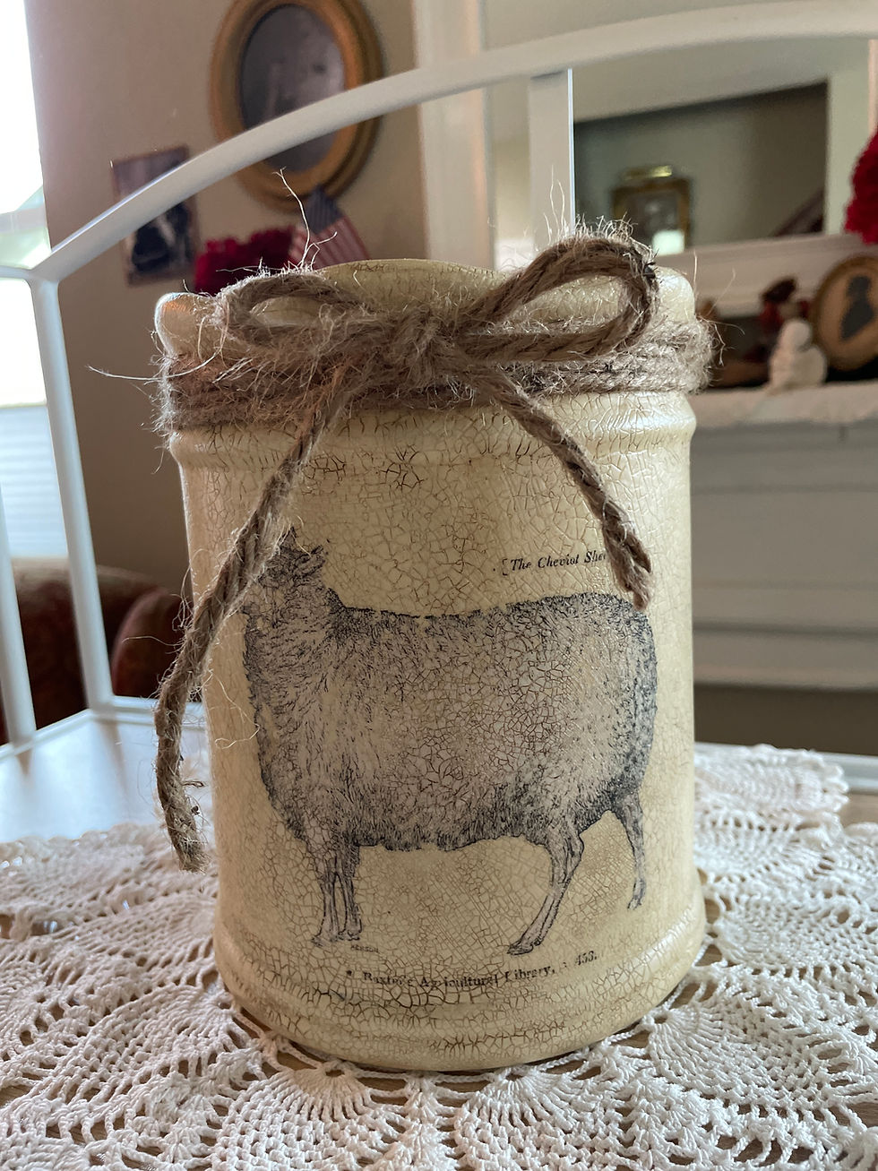 Thumbnail: Front view of the "Stoic Sheep" upcycled, hand painted planter shown without flowers