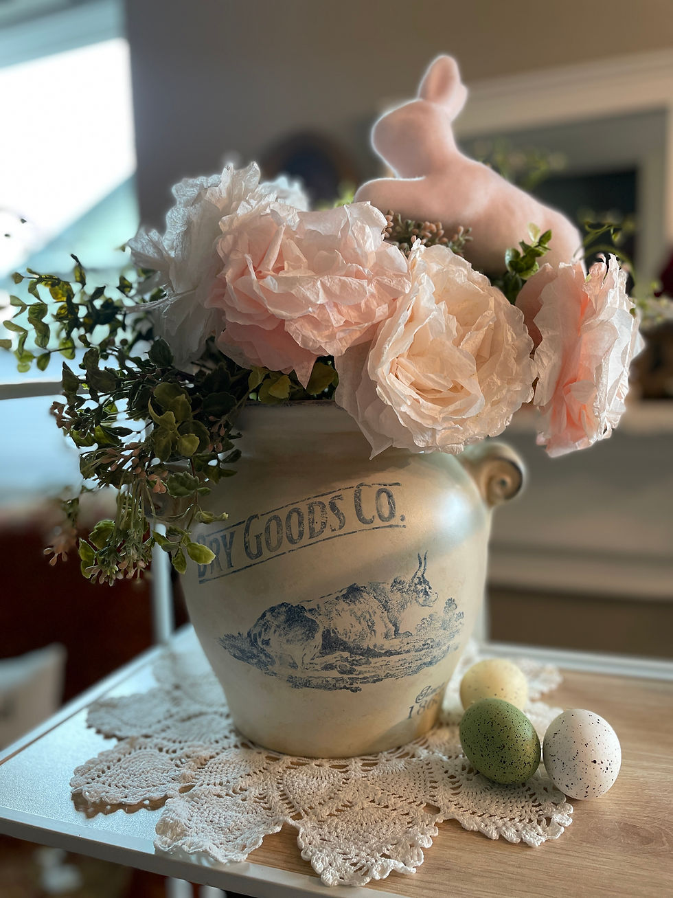 "Dry Goods Co." Upcycled urn from Lula Boo's Crafting Company, front view. Shown with flowers.