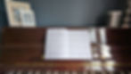 Thumbnail: Double-page spread of the first two pages of 'The Lamb' sheetmusic for voice and piano, sitting on Abby's piano.