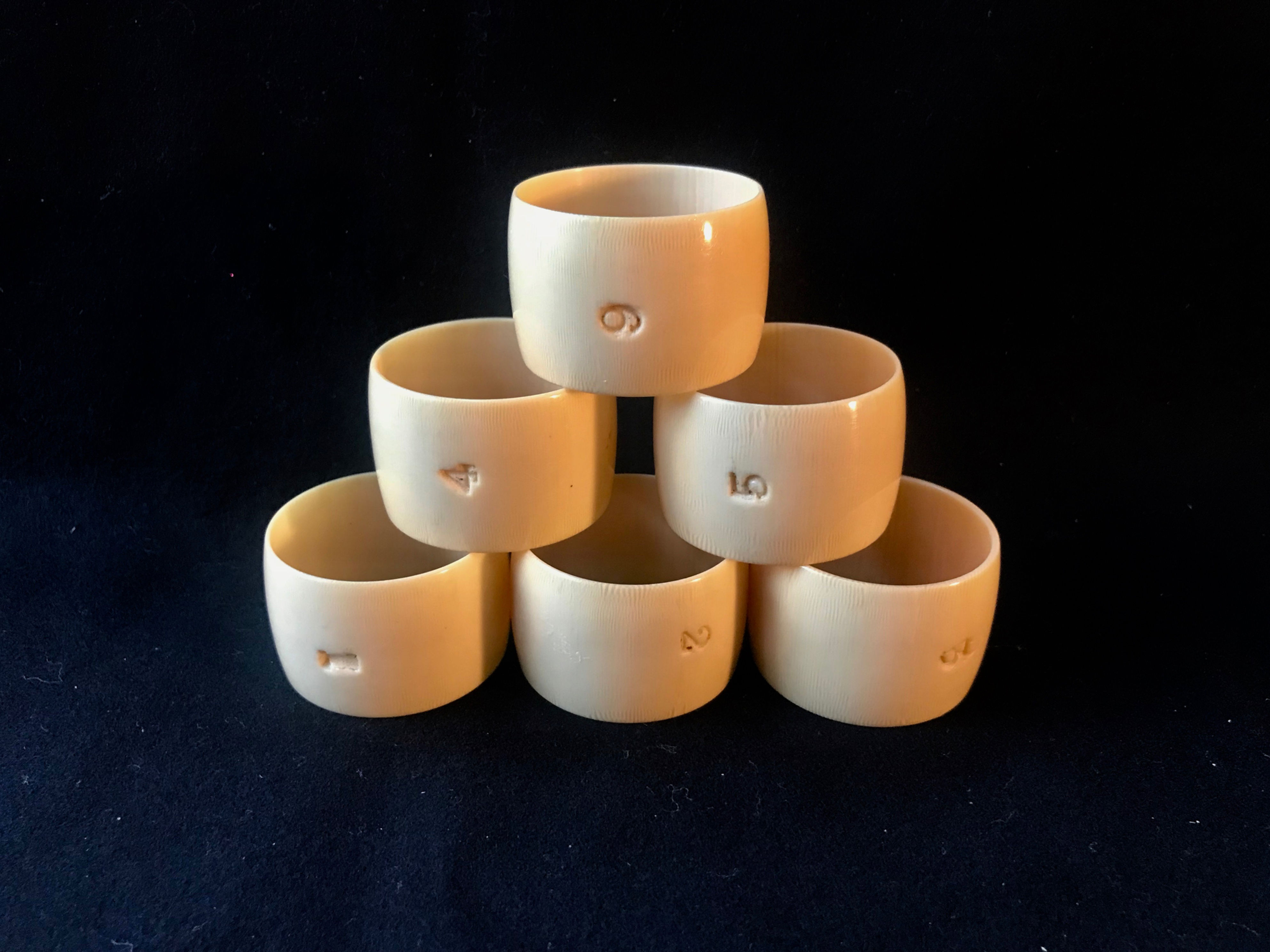 VINTAGE CELLULOID/BAKELITE NAPKIN RINGS