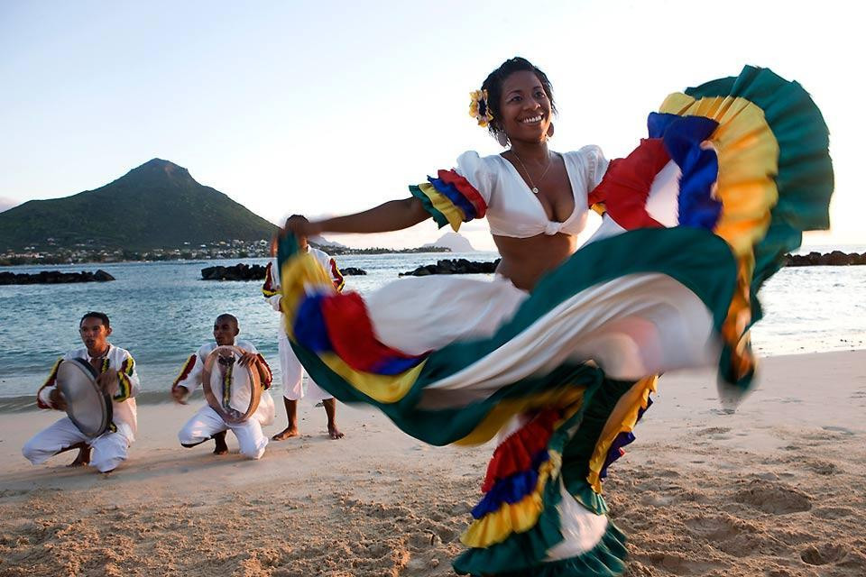 Mauritian women dancing to Sega