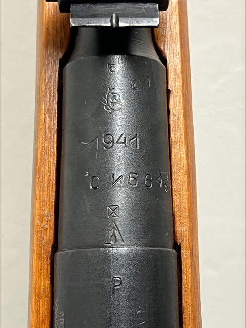 Original 1941 Izhevsk 91/30 and an original and authentic 1944 PU scope.
The markings on the rifle barrel: From what I've gathered the rifle (and stock) are marked with the "box with the 'X'" which indicate a post war refurbished rifle and stock. I'm still trying to figure out what the 'P' means centered below all the other markings.
The PU Scope: Serial number indicates late 1944 manufacture. Below the serial number is the "box with the 'X'" which indicates early 1950's arsenal refurbishment.