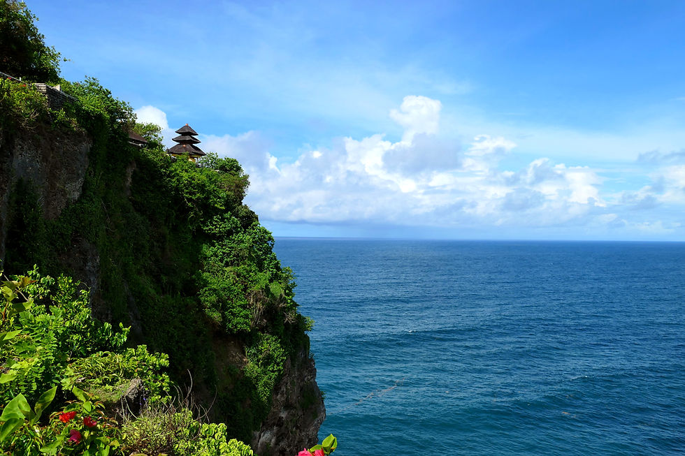 Pura Luhur Uluwatu temple on its clifftop above the Indian Ocean in south Bali, a classic day trip from Canggu