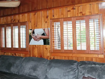 Normandy Wood interior plantation shutters installed in a family room