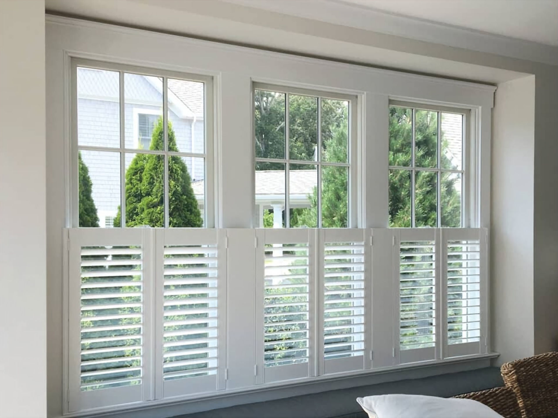 Normandy Wood cafe style interior shutters in a bathroom