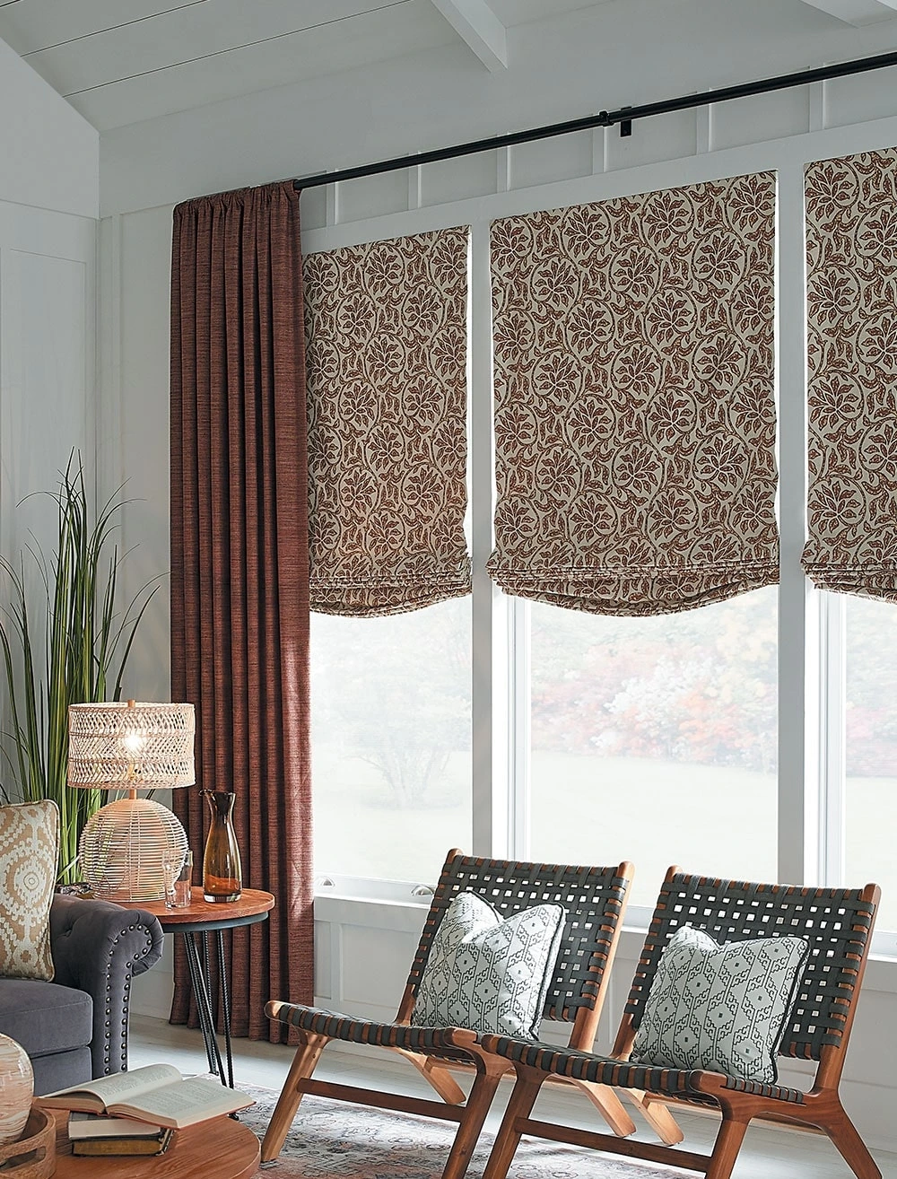 Drapery Panels and Relaxed Roman Shades look great together
