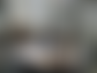 Tech startup team reviewing product design sketches in office