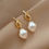 Thumbnail: Knotted Pearl Earrings