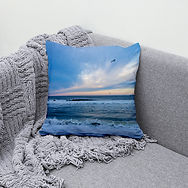 photograph of pastel beach image on a pillow