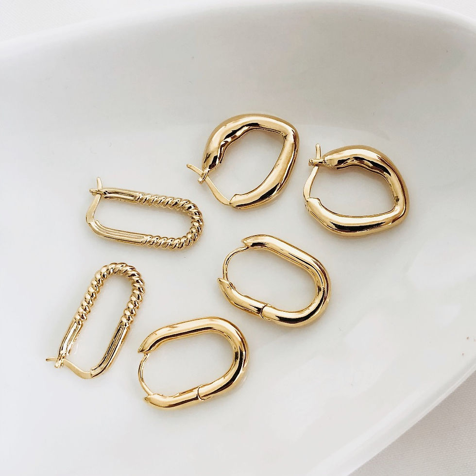 Thumbnail: Loren Oval Twist Hoop Earrings - Gold