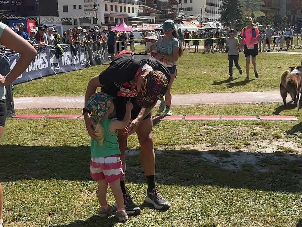 Brennan at the finish line of the Tignes Marathon