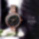 A rose gold watch with a black face displays ornate numbers, set against a dark background with white tulips. Text: "xylus by Titan." - Branding by Identity Counsel