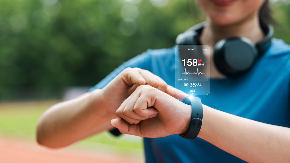 a woman checking her aerobic threshold on a heart rate monitor