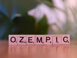 Scrabble tiles with the word 'Ozempic' - one of the most popular weight loss jabs on the market