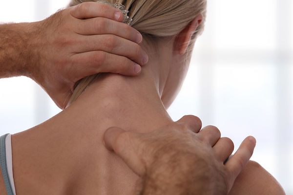 chiropractor treating neck pain