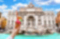 Italian ice cream gelato in front of amazing Trevi Fountain in Rome, Italy. Trevi Fountain
