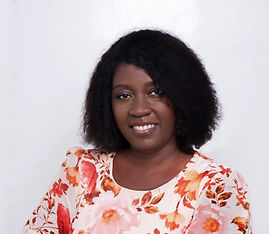 Author Patricia Peprah smiling against a neutral background