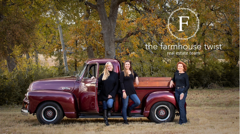 three women in black tops and jeans leaning on an old truck, with the farmhouse twist real estate team