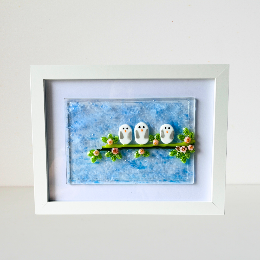 Three Birdies together on the Branch