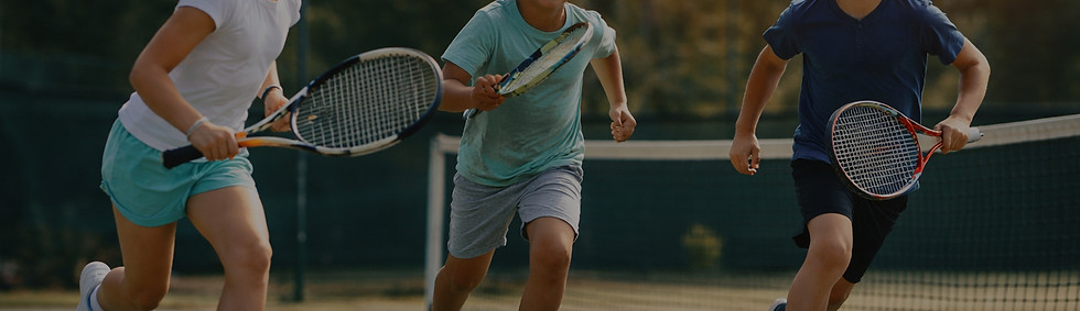 Children playing tennis under the sun_ed