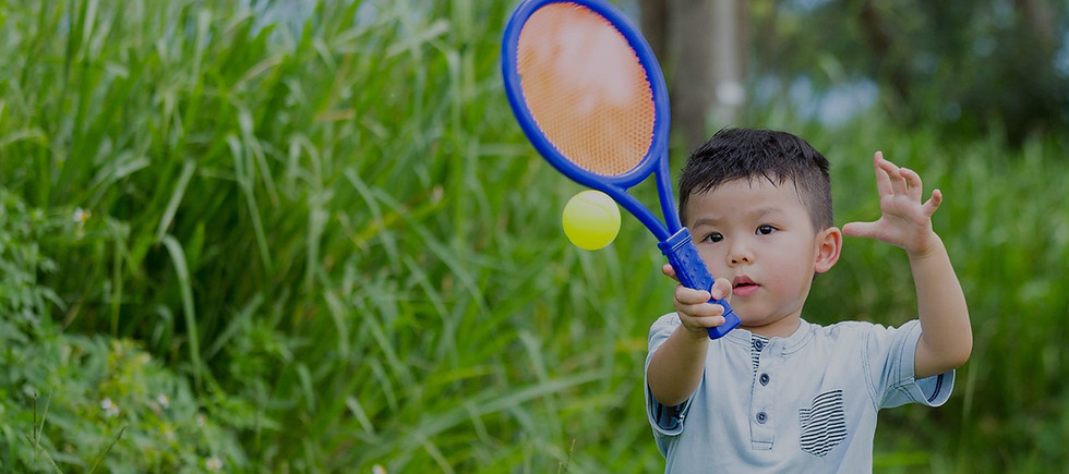 asian-little-boy-playing-tennis-at-outdo